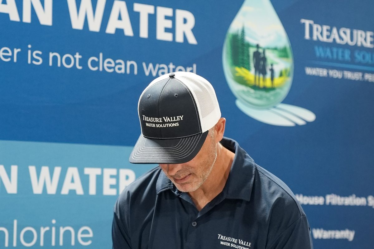 Treasure Valley Water Solutions stand explaining chlorine, chemicals and hardness