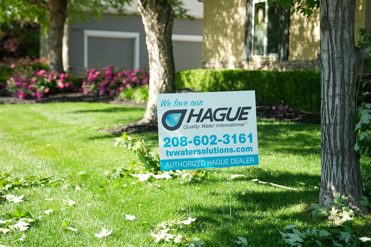 An authorized Hague dealer sign in a Treasure Valley front yard