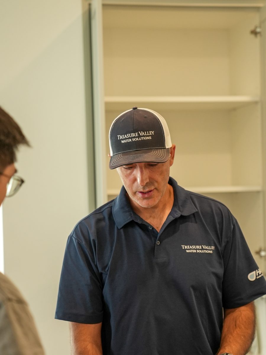 Going through the numbers with a customer after a water test