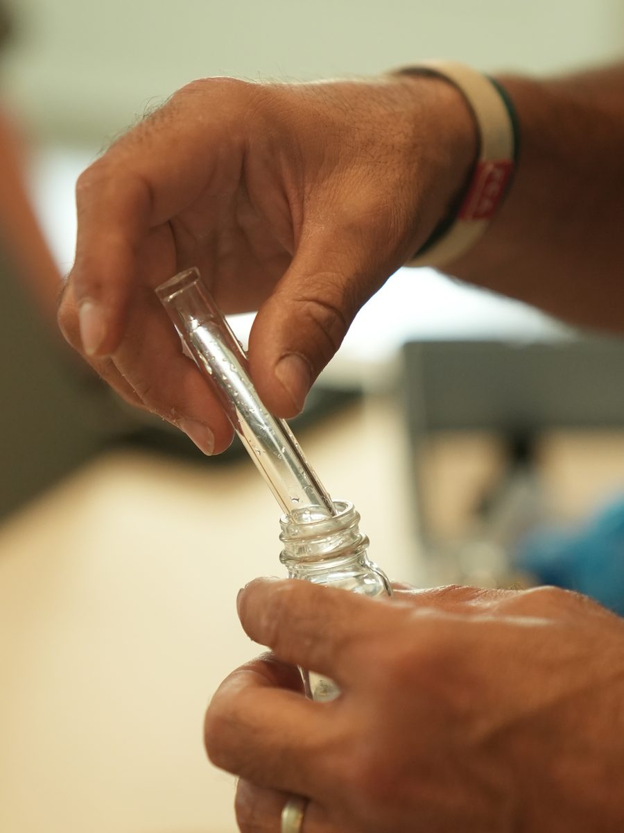A water sample drawn into a test vial during a free water test