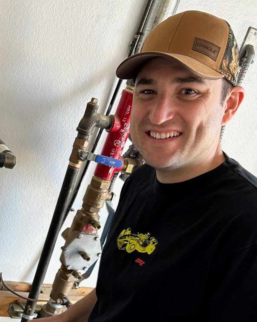 Robert K. Smith, service manager at Treasure Valley Water Solutions, servicing a Hague WaterMax system